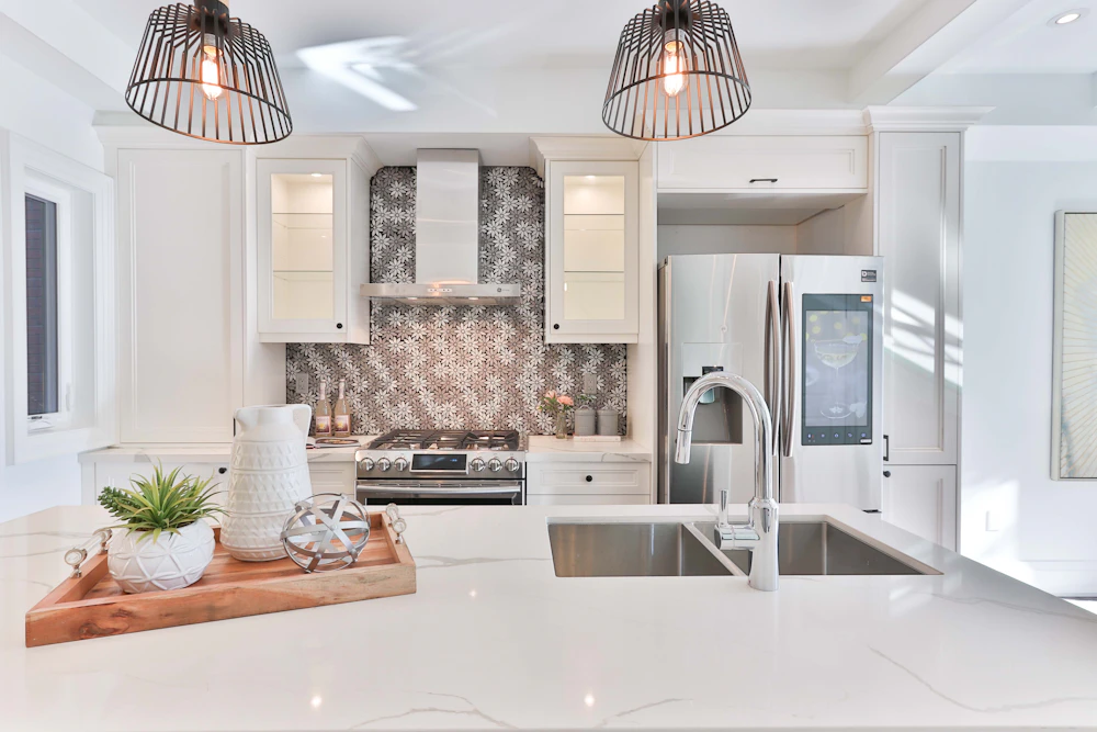 White kitchen with a patterned tile backsplash